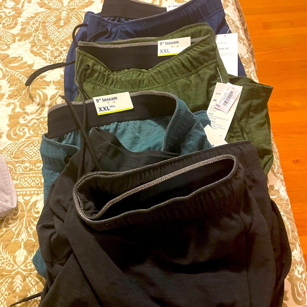 Four pairs of men's XXL tall activewear shorts.
